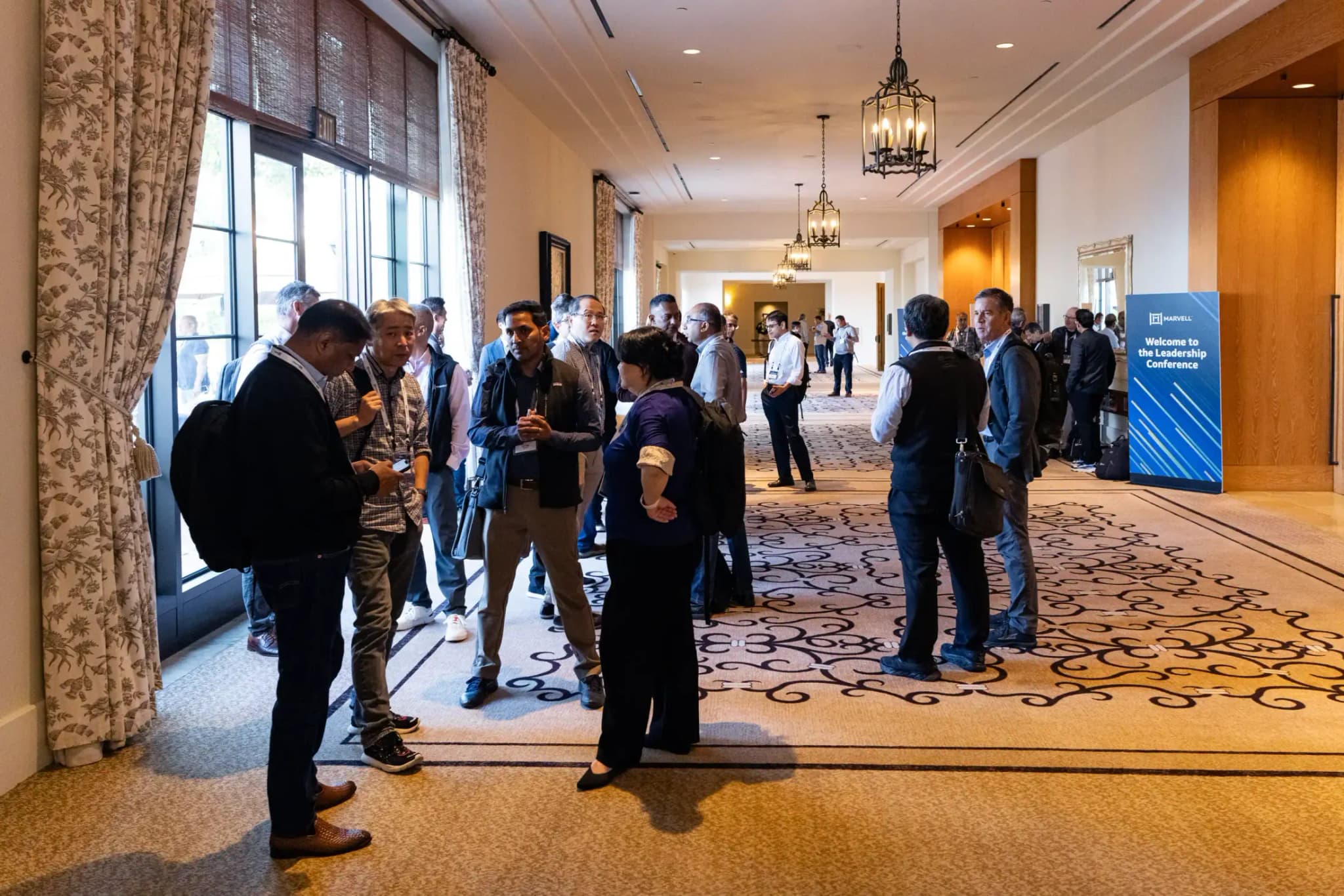 Leadership Conference attendees gathering in the lobby.