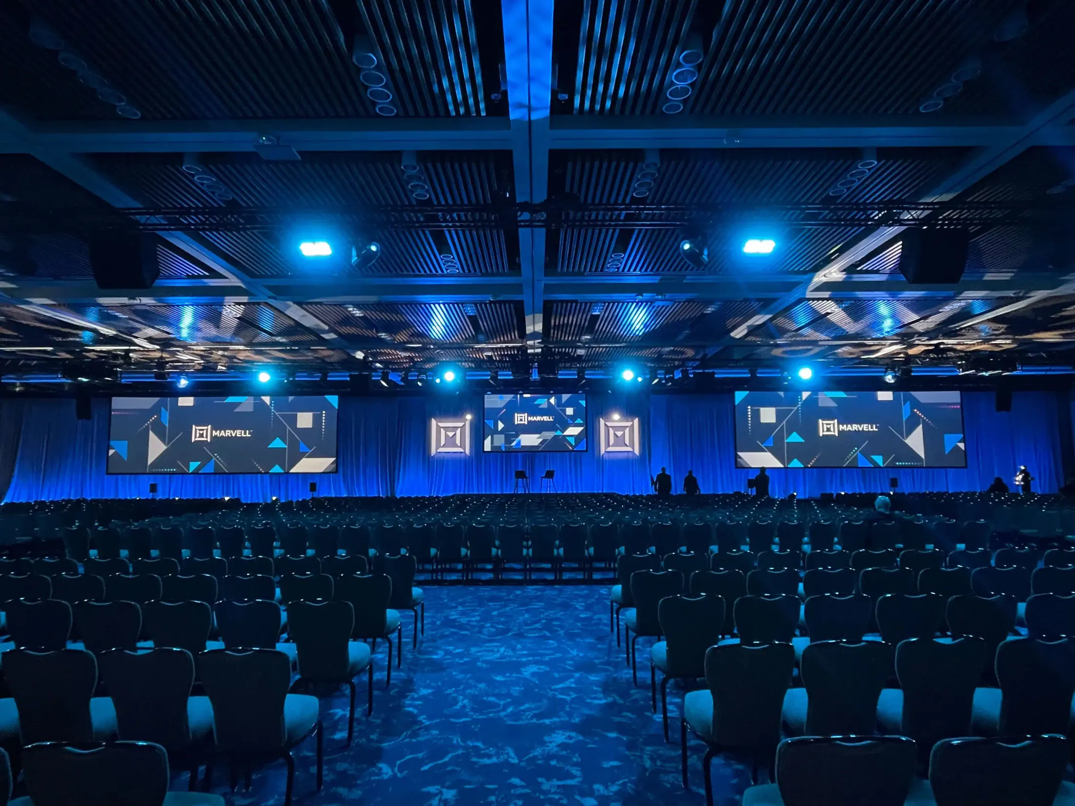 Wide view of the All Employee Meeting stage.