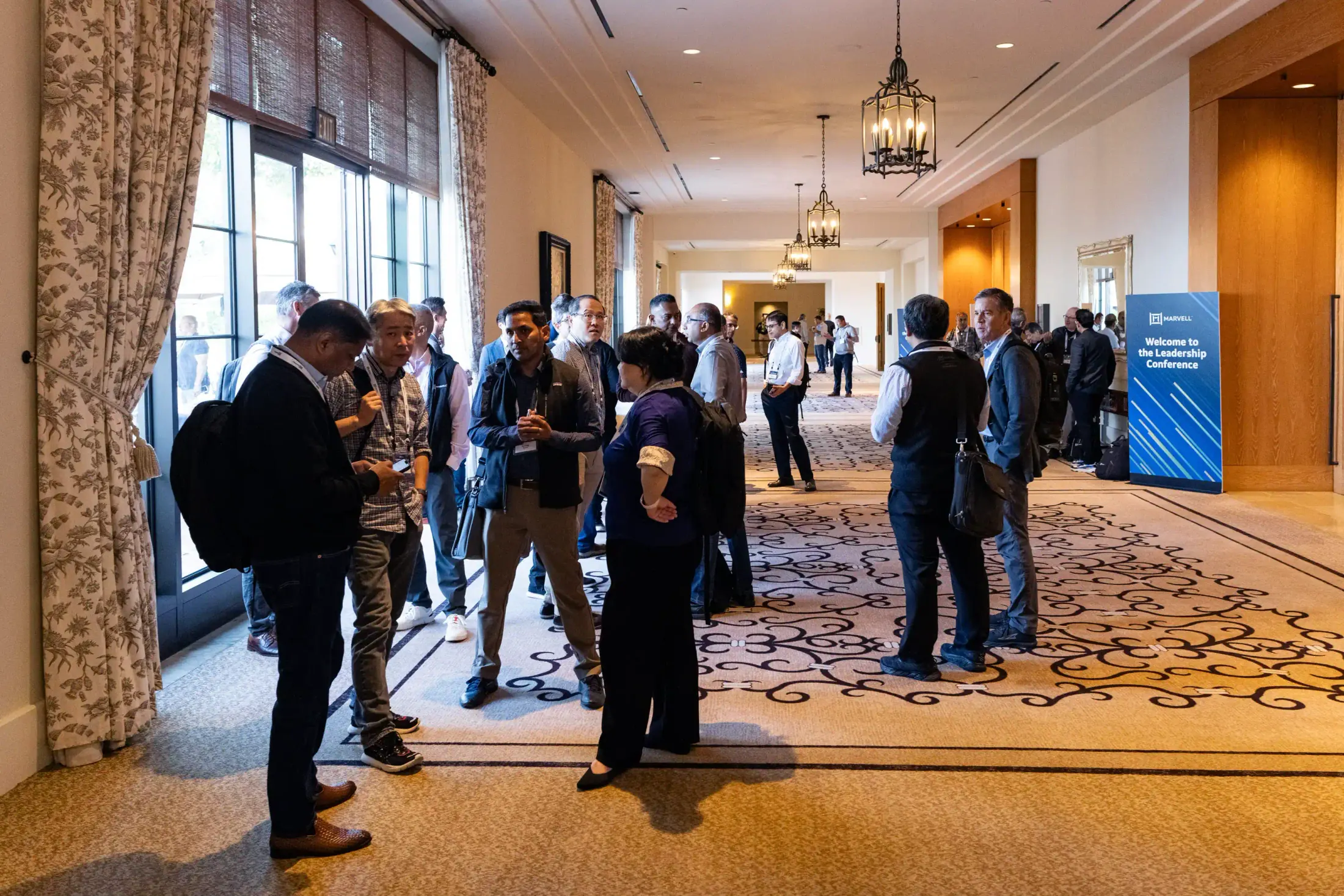 Leadership Conference attendees gathering in the lobby.