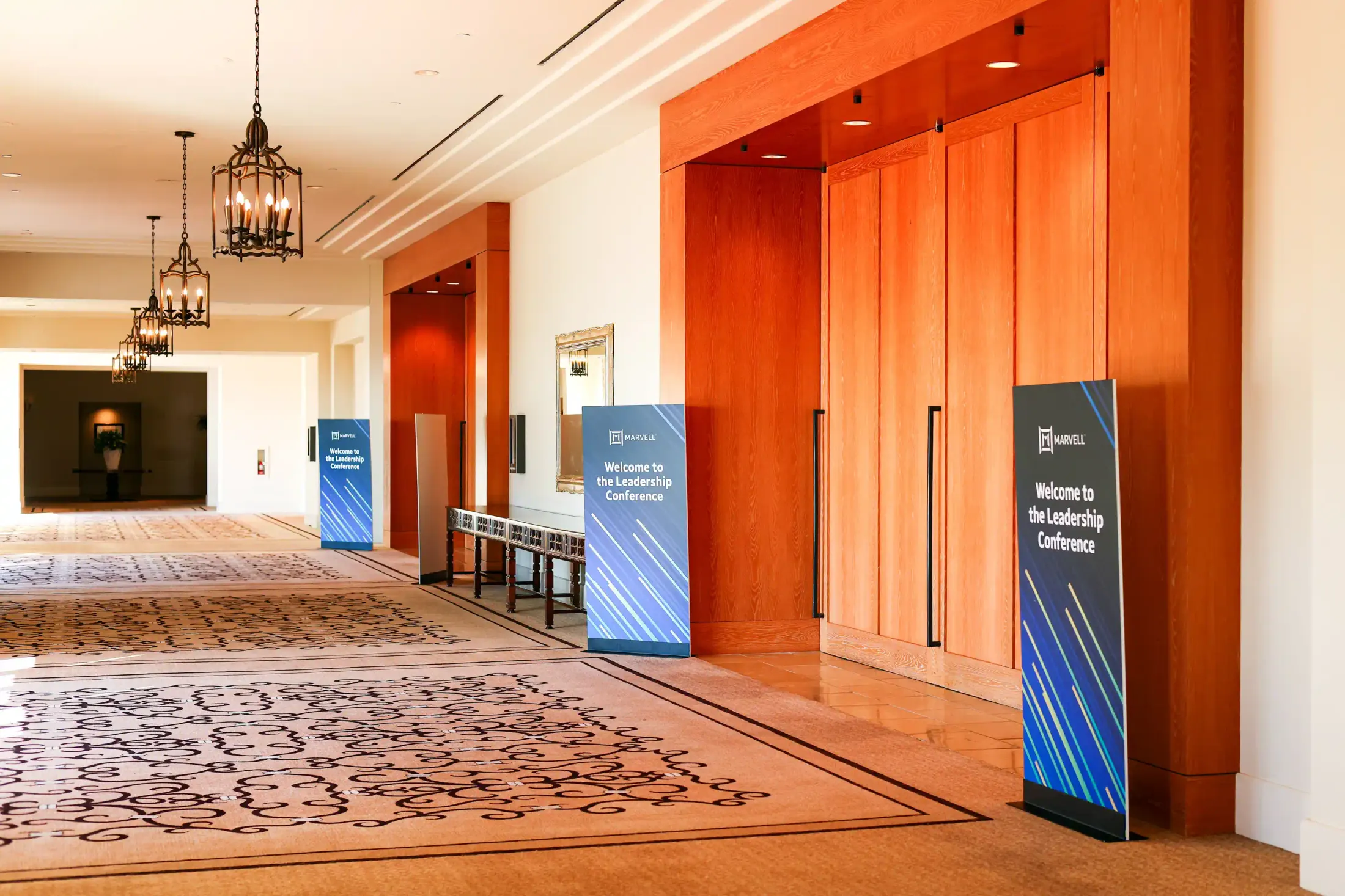 Branded entrance doors and wayfinding signage.