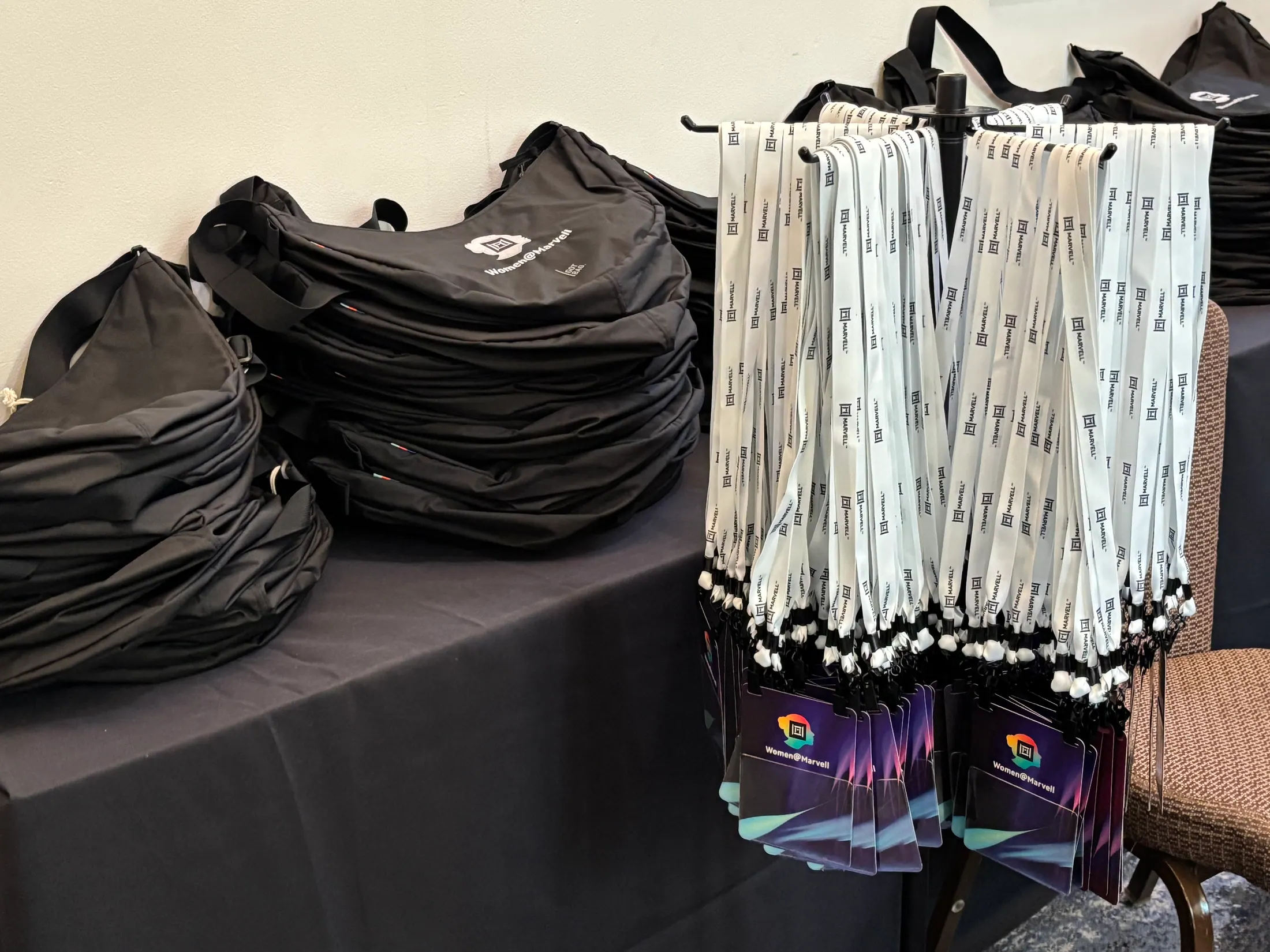 Badges and swag for the Women@Marvell RENEW Conference.