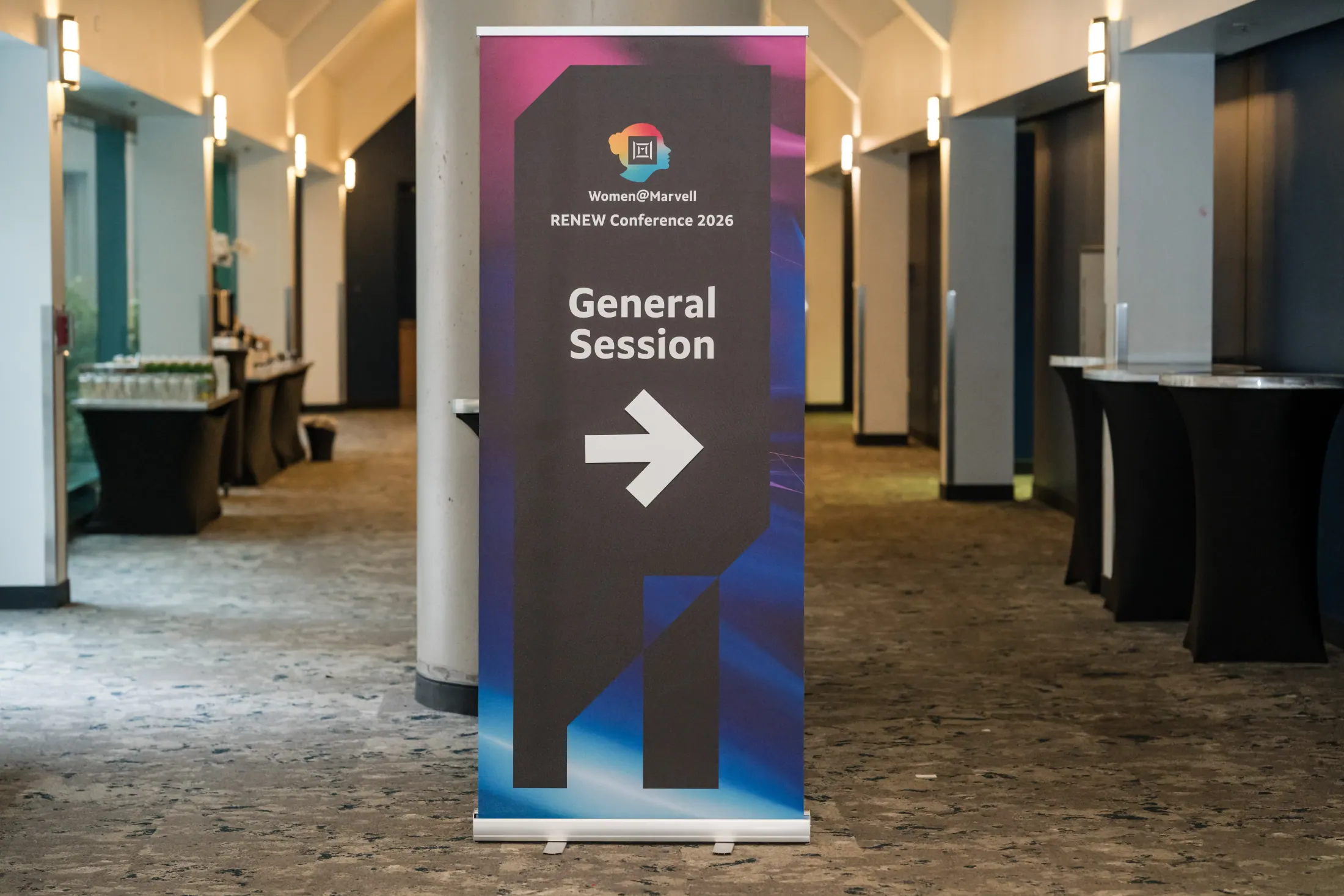 Wayfinding signage for the Women@Marvell RENEW Conference.